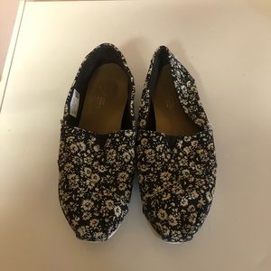 Toms, black and cream slip-ons. Size 9.5